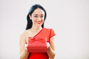 A woman holding a gift photo