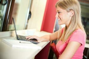 A woman with a laptop photo