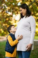 Pregnant woman and her son photo