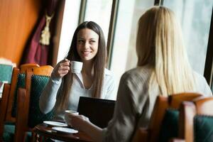 Friends in a cafe photo