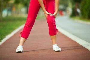 un mujer corriendo foto