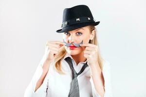 Portrait of a woman with a paper mustache photo