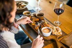 A woman having dinner photo