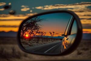 sunset on a car mirror illustration photo