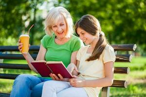 A grandmother spending time with her granddaughter photo