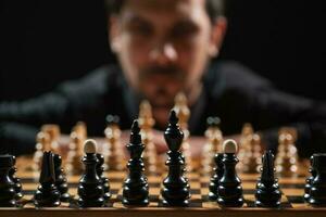 A man playing chess photo