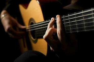 Playing an acoustic guitar photo