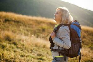 A senior woman hiking photo