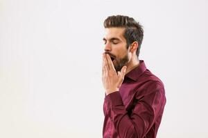 A man in a purple shirt photo