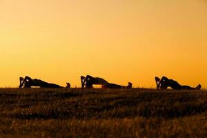 Women doing physical exercises photo