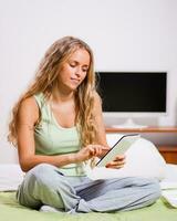 A woman in her bedroom photo