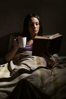 A young woman resting in the bed photo