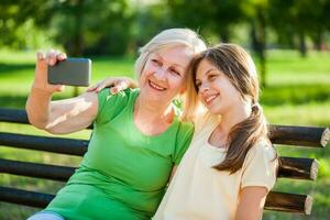 A grandmother spending time with her granddaughter photo