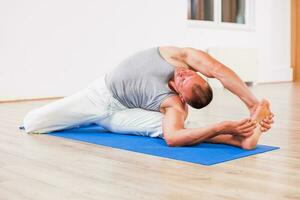 Man doing physical exercises photo