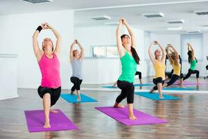 Women doing physical exercises photo