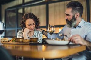 A couple having dinner photo