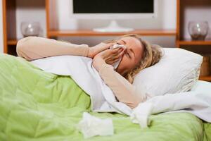 A woman in her bedroom photo