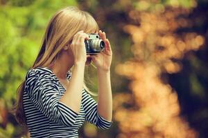 A woman with a camera photo