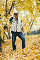 A senior man hiking photo