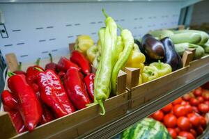 Healthy fruit and vegetables in grocery shop photo