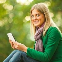 A happy woman in the park photo