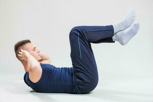 A man doing physical exercises photo