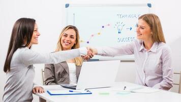 Businesswomen discussing a business plan photo