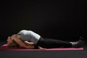 A woman doing exercises photo