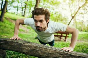 A man doing physical exercises photo