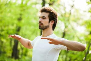 A man doing physical exercises photo