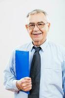 Portrait of a happy senior businessman photo