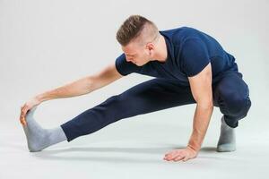 A man doing physical exercises photo