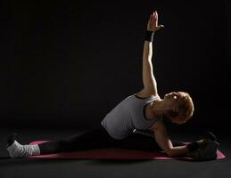 A woman doing exercises photo