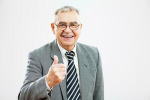 Portrait of a happy senior businessman photo