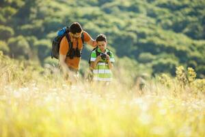 Father and son hiking photo