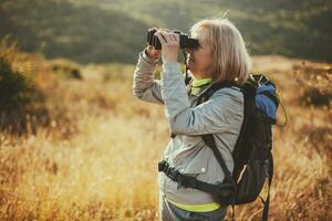 A senior woman hiking photo