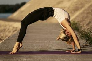 A woman doing physical exercises photo