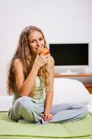 A woman in her bedroom photo