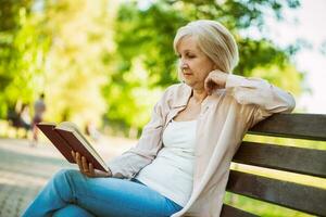 A senior woman in the park photo