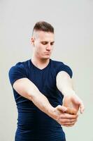 A man doing physical exercises photo