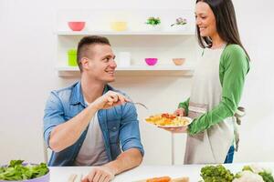 A couple eating together photo