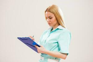 Portrait of a nurse with clipboard photo