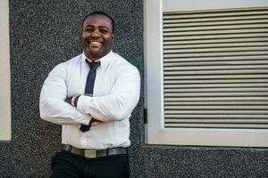 Portrait of a happy Afro businessman photo