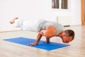 Man doing physical exercises photo