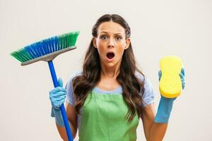 A woman who is going to clean the house photo