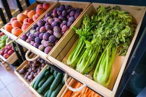 Healthy fruit and vegetables in grocery shop photo