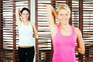 Women doing physical exercises photo