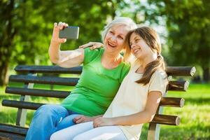 A grandmother spending time with her granddaughter photo