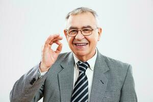 Portrait of a happy senior businessman photo