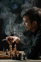 A man playing chess photo